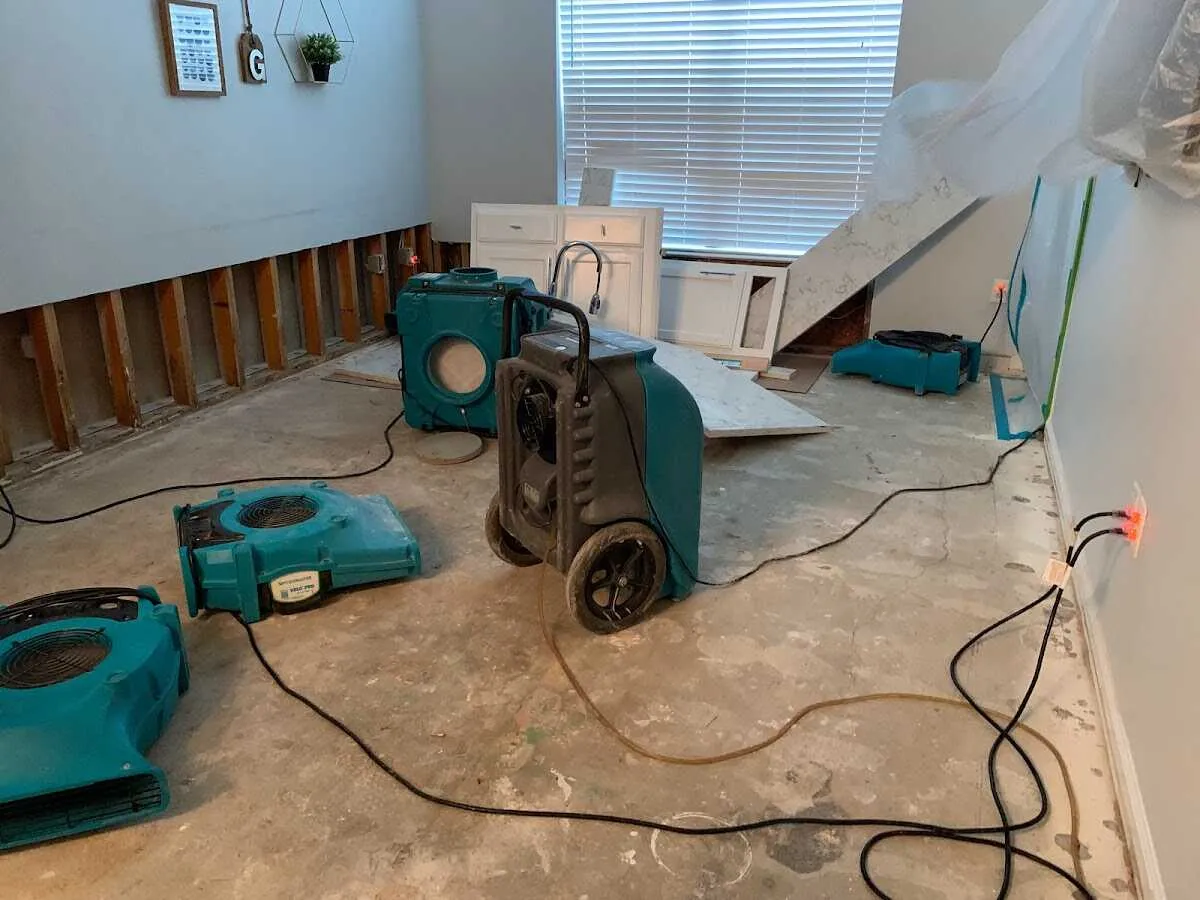 Dehumidifier in flood-cut room for Water Extraction & Removal in Saline